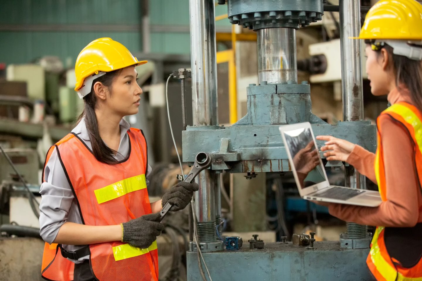 industrial factory worker working in metal manufacturing industry